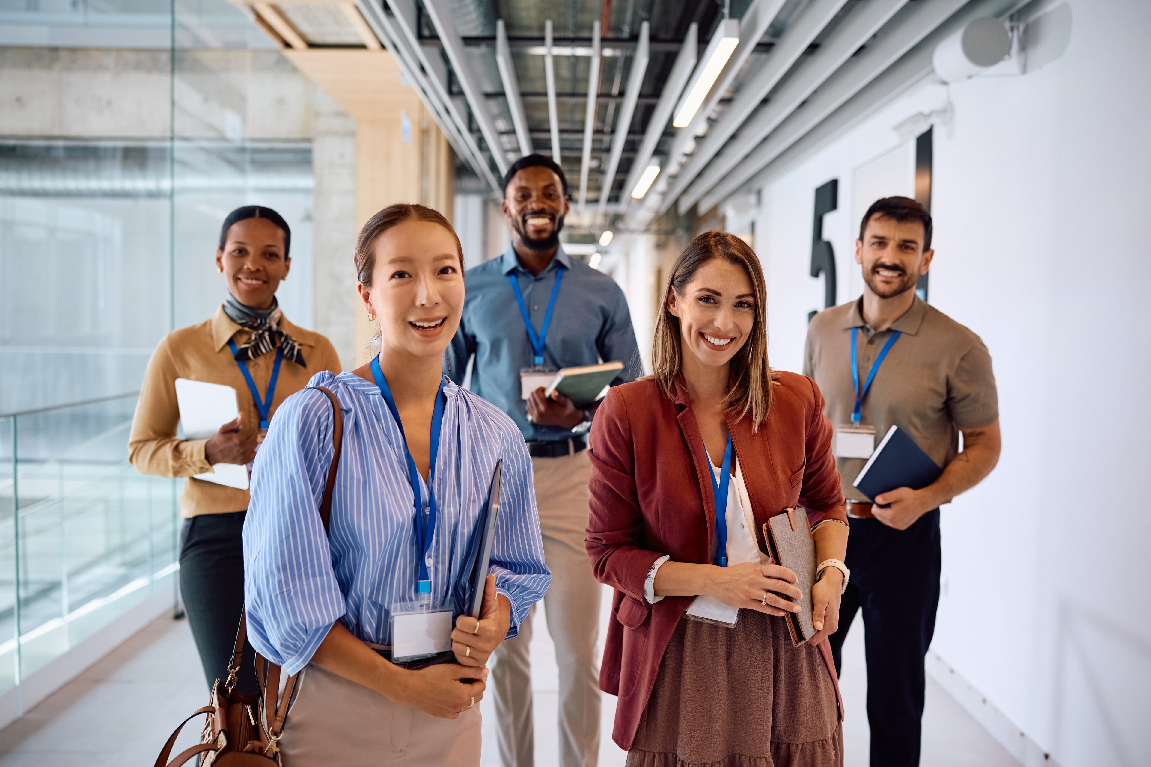 smiling_professionals_in_an_office_corridor_2026_09_22_07_11_45_utc_4e8cb0e054.jpg