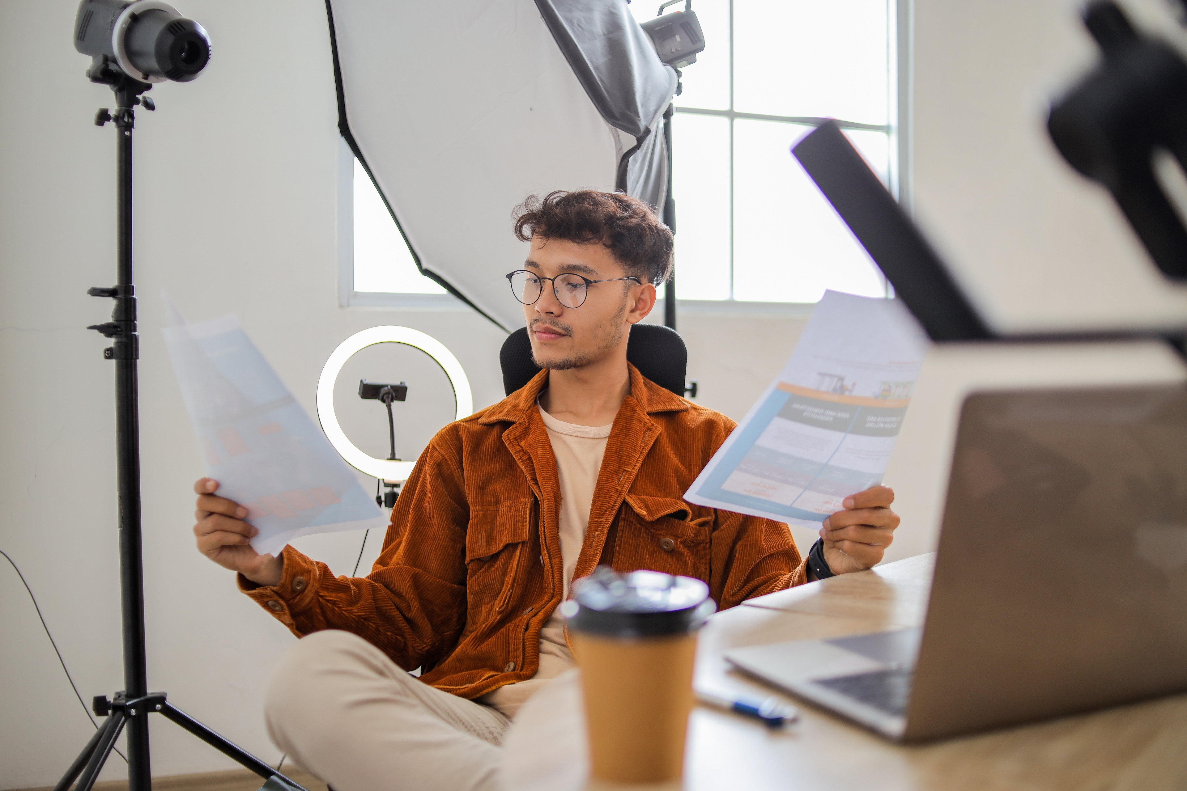 young_professional_man_reviewing_documents_in_brig_2026_09_25_05_06_15_utc_a305db8bf0.jpg
